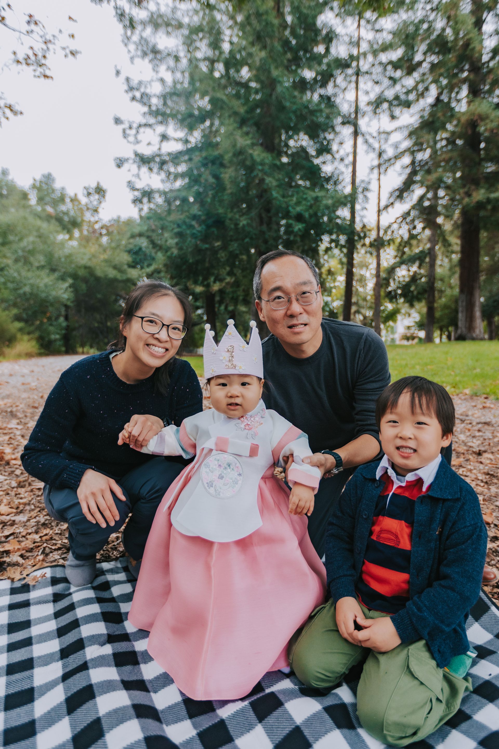 Wonman Lee with his family in a Menlo Park park